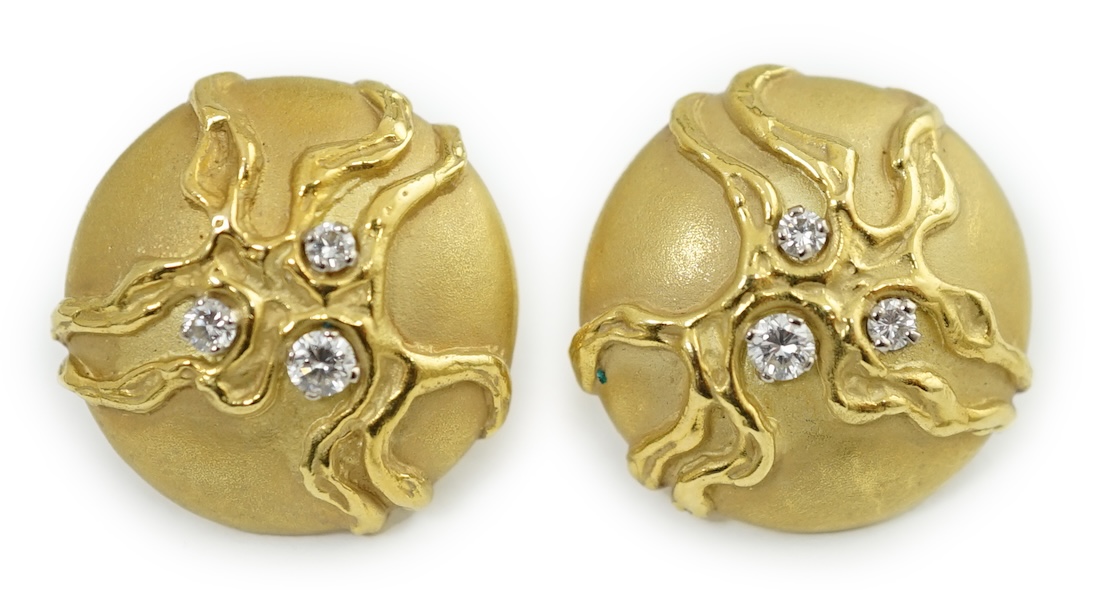 A pair of 18ct yellow gold circular dome stud earrings, each set with three graduated diamonds within a twisted branch design, hallmark London 1974, and matted ground